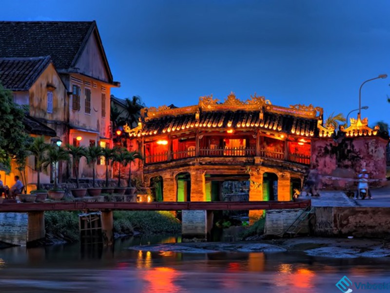 Japanese Covered Bridge lit up at night in Hoi An