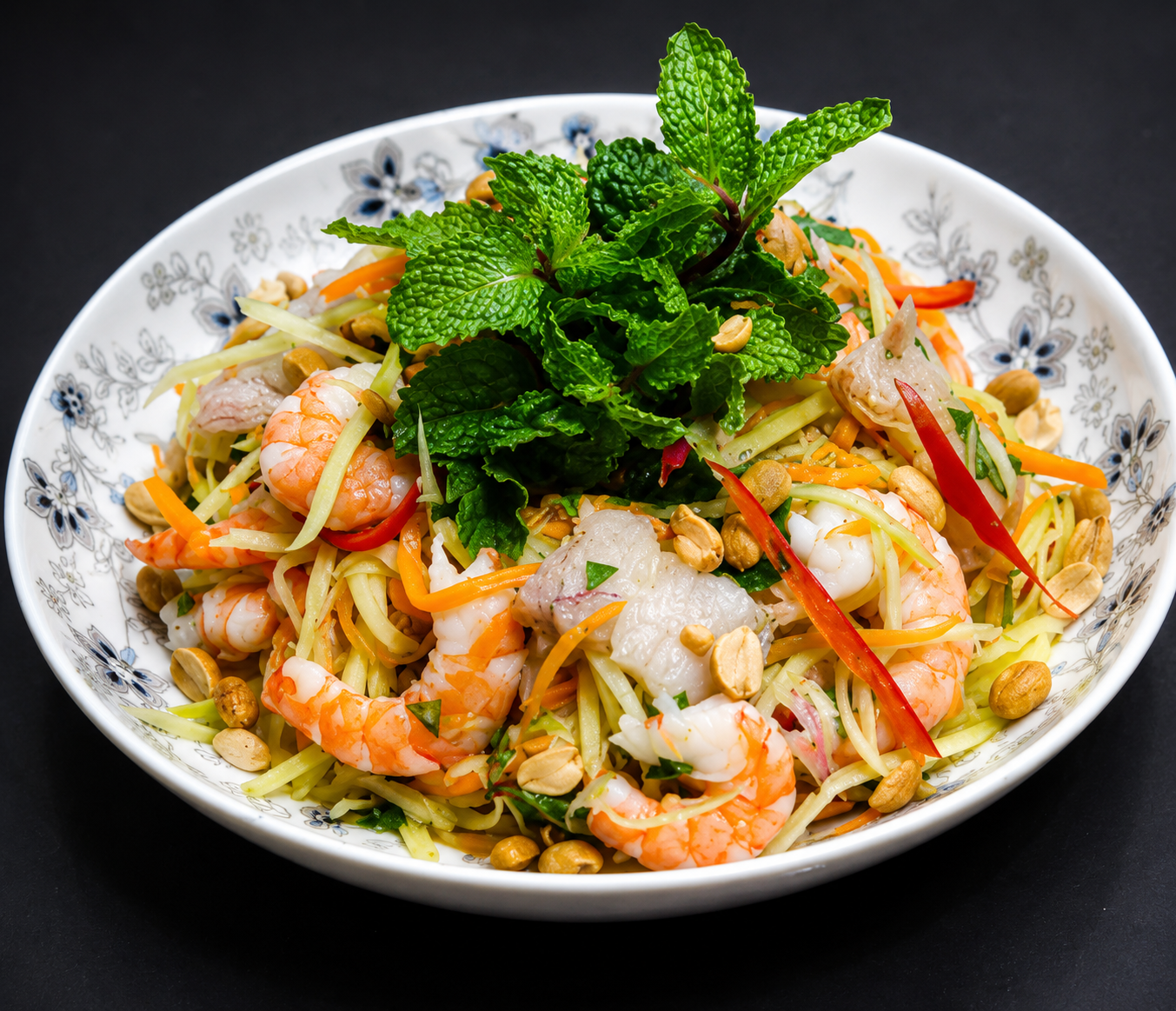 Mango Salad prepared during Hoi An cooking class Tra Que Village